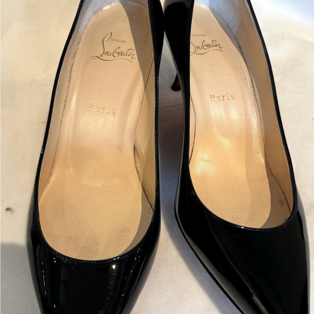 LOUBOUTIN kitten heels. Black patent.